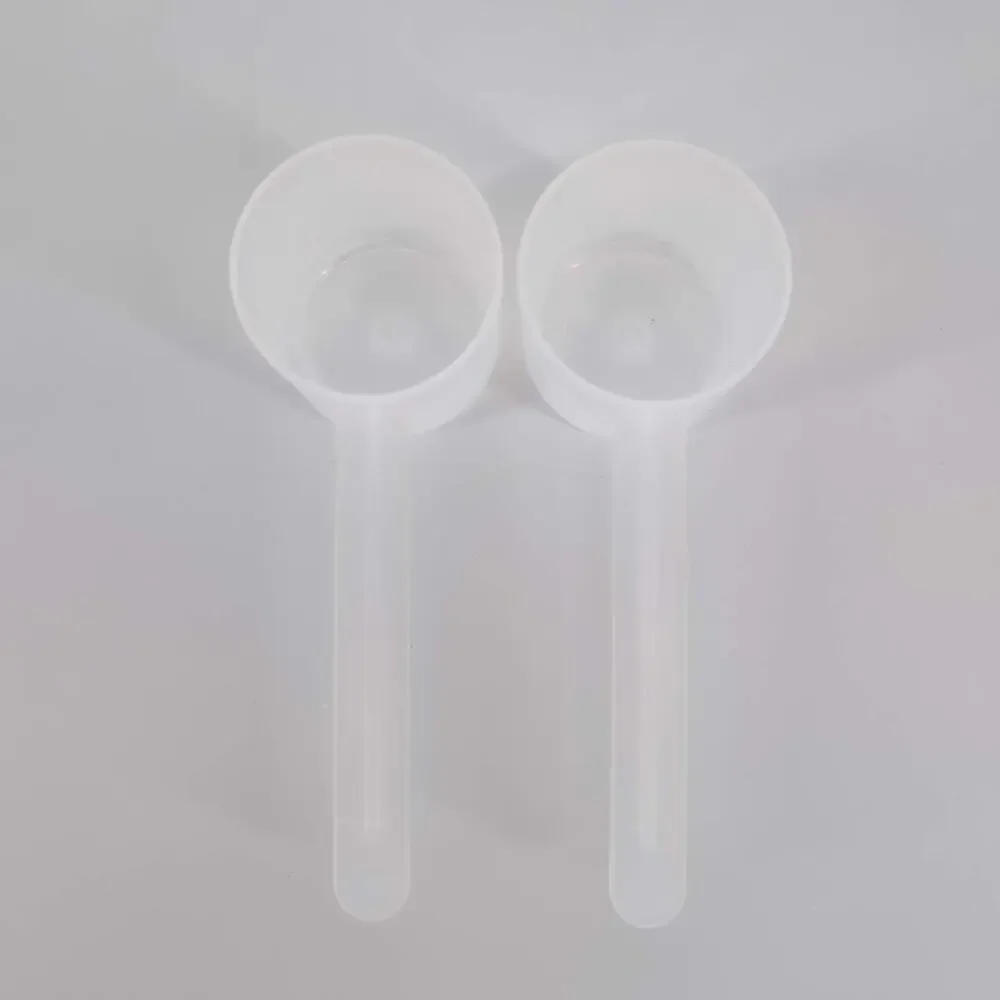 Two National Measures Transluscent Plastic Long Handle Measuring Scoops - 60 CC